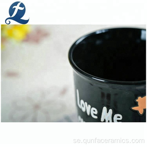 Kreativ svart tryckt keramiskt kaffemugg med handtag